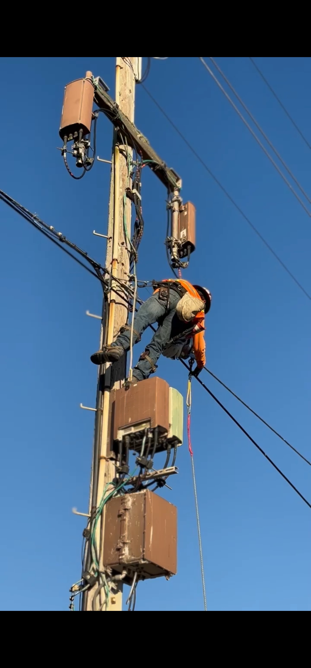 Line Bros LLC field crew executing aerial OSP utility pole construction